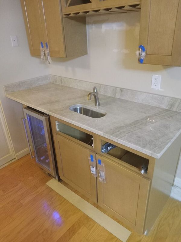 Quartzite wet bar countertop with wine cooler