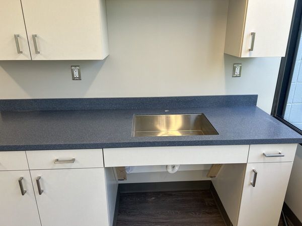 Corian countertop kitchen with stainless steel sink